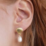 Wholesale Shell Pearl Drop Earrings, S925 sterling silver, with natural irregular freshwater pearls and a shell design, available in 18K gold or platinum plating, ideal for fashion jewelry wholesale from junejewelry.com.