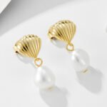 Wholesale Shell Pearl Drop Earrings, S925 sterling silver, with natural irregular freshwater pearls and a shell design, available in 18K gold or platinum plating, ideal for fashion jewelry wholesale from junejewelry.com.