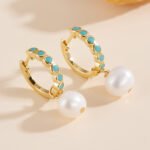 Wholesale Turquoise Pearl Huggie drop earrings, 925 sterling silver, with natural freshwater pearls and turquoise inlay, 18K gold plated, ideal for fashion jewelry wholesale from junejewelry.com.