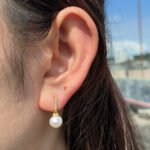 Wholesale Zircon Pearl Drop earrings, S925 sterling silver, with natural freshwater pearls and zircons, French niche design, ideal for cross-border fashion jewelry wholesale from junejewelry.com.