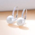 Wholesale Pearl Leverback Earrings, S925 sterling silver, with natural freshwater pearls, available in 18K gold or platinum plating, ideal for fashion jewelry wholesale from junejewelry.com.