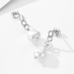 Wholesale Baroque Pearl Earrings, 925 sterling silver, with natural freshwater baroque pearls and a Cuban chain design, available in 18K gold or platinum plating, ideal for fashion jewelry wholesale from junejewelry.com.