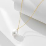 Wholesale sterling silver minimalist baroque pearl pendant necklace – 18K gold plated influencer-style jewelry from JuneJewelry.com