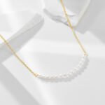 Wholesale sterling silver horizontal rice pearl bar necklace – 18K gold plated minimalist design from JuneJewelry.com