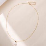 Wholesale sterling silver minimalist pearl pendant necklace with single freshwater pearl – 18K gold or platinum plated from JuneJewelry.com