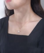 Wholesale Zircon Pearl Necklace, S925 sterling silver, with a shell pearl and zircon pendant, available in 18K gold or platinum plating, ideal for fashion jewelry wholesale from junejewelry.com.