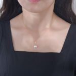 Wholesale Zircon Pearl Necklace, S925 sterling silver, with a shell pearl and zircon pendant, available in 18K gold or platinum plating, ideal for fashion jewelry wholesale from junejewelry.com.