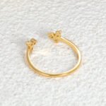 Wholesale dainty zircon ring in adjustable open style with 18K gold-plated brass and fine zircon accents for minimalist fashion lovers.