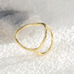 Wholesale French minimalist ring with geometric cut-out design in 18K gold plating - stackable brass finger jewelry | JuneJewelry.com
