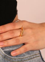 Wholesale open zircon ring with micro-paved stones and 18K gold plating, French minimalist adjustable ring from JuneJewelry.com.