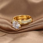 Wholesale six prong zircon ring in 18K gold plated brass – vintage style women’s fashion jewelry from JuneJewelry.com