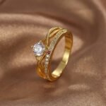 Wholesale zircon gold ring for women – 18K gold plated brass with white zircon from JuneJewelry.com, fashion jewelry for bulk orders.