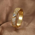 Wholesale heart zircon ring for women with 18K gold plated brass – minimalist romantic jewelry from JuneJewelry.com.