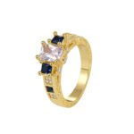 Wholesale square zircon ring featuring an 18k gold plated copper design with a prominent square-cut zircon and intricate micro-pave white zircons from junejewelry.com