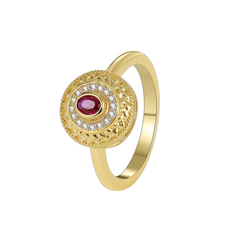 R0370 (6) Wholesale vintage red zircon ring featuring an 18k gold plated copper design with a prominent red zircon and intricate micro-pave white zircons from junejewelry.com