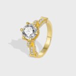 Wholesale retro design zircon ring featuring an 18k gold plated copper design with sparkling zircons from junejewelry.com