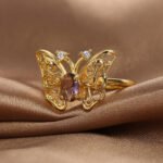 Wholesale butterfly zircon ring with 18K gold plated brass – French sweet-cool fashion jewelry from JuneJewelry.com for bulk buyers.