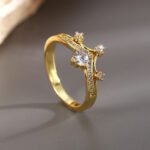 Wholesale dainty zircon ring with micro-pavé white stones in 18K gold plated brass from JuneJewelry.com – minimalist fashion jewelry for women.