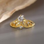 Wholesale retro crown ring for women, 18K gold plated copper with an intricate crown design from junejewelry.com