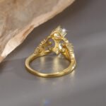 Wholesale retro crown ring for women, 18K gold plated copper with an intricate crown design from junejewelry.com