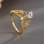 Wholesale retro crown ring for women, 18K gold plated copper with an intricate crown design from junejewelry.com