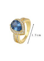 Wholesale French modern minimalist teardrop blue zircon ring for women, 18K gold plated copper with a sparkling blue zircon from junejewelry.com