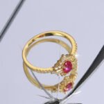 Wholesale red oval ring, 18K gold plated copper, with a luxurious red oval zircon, ideal for fashion jewelry wholesale from junejewelry.com.