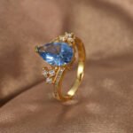 Blue teardrop zircon ring for women – 18K gold plated copper wholesale jewelry from JuneJewelry.com
