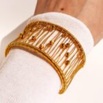 Wholesale mesh cuff bracelet with wire wrap and gold beads in 18K gold plated brass from JuneJewelry.com – handcrafted wide statement bangle.