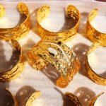 Wholesale hammered texture bracelet with wide open cuff and gold plated brass – vintage fashion jewelry from JuneJewelry.com.