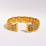 Wholesale mesh chain bracelet in 18K gold plated brass with open grid woven design from JuneJewelry.com – modern fashion jewelry for bulk orders.