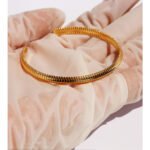 Gold snake chain jewelry set – bangle, ring, and earrings in 18K gold plated copper from JuneJewelry.com