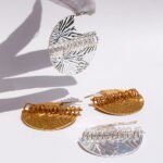 Wholesale Statement Earrings, copper material, with a unique spliced circular faceted pattern, available in 18K gold or platinum plating, ideal for fashion jewelry wholesale from junejewelry.com.