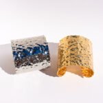 Wholesale statement bangle bracelet with foil-wrinkle texture, wide metal open cuff plated in 18K gold or platinum – bold fashion jewelry from JuneJewelry.com.