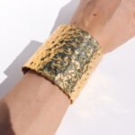 Wholesale statement bangle bracelet with foil-wrinkle texture, wide metal open cuff plated in 18K gold or platinum – bold fashion jewelry from JuneJewelry.com.