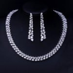 Wholesale textured cluster necklace and earring set with platinum plating from JuneJewelry.com – elegant copper fashion jewelry for bulk orders.