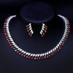 Wholesale emerald CZ necklace and earring set with platinum plated copper, featuring green and clear cubic zirconia stones, from JuneJewelry.com