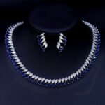 Wholesale emerald CZ necklace and earring set with platinum plated copper, featuring green and clear cubic zirconia stones, from JuneJewelry.com