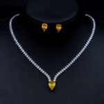 Wholesale platinum plated CZ necklace and earring set with pear-shaped stones from JuneJewelry.com – high quality, affordable fashion jewelry for bulk orders.