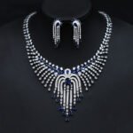 Wholesale elegant waterfall CZ necklace and earring set from JuneJewelry.com – high-quality fashion jewelry for bulk orders.