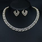 Wholesale marquise leaf necklace and earring set with platinum plating from JuneJewelry.com – elegant copper fashion jewelry for bulk orders.