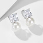 Wholesale Zircon Pearl Earrings, S925 sterling silver, with pearls and square zircons, available in 18K gold or platinum plating, ideal for fashion jewelry wholesale from junejewelry.com.