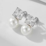 Wholesale Zircon Pearl Earrings, S925 sterling silver, with pearls and square zircons, available in 18K gold or platinum plating, ideal for fashion jewelry wholesale from junejewelry.com.