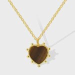 Tiger eye heart pendant necklace in vintage brown tones, 18K gold plated, wholesale fashion jewelry from JuneJewelry.com