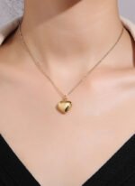 Wholesale 3D heart pendant necklace in 18K gold plated brass – minimalist love charm jewelry from JuneJewelry.com.