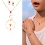 Wholesale Children Pearl Star Jewelry Set, titanium steel with 18K gold plating, featuring pearl and star designs on a necklace, bracelet, ring, and earrings, ideal for children's fashion jewelry wholesale from junejewelry.com.