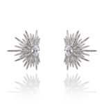 Wholesale starburst stud earrings with a central oval cubic zirconia and micro-pavé stones, platinum-plated brass and 925 silver needle from JuneJewelry.com.