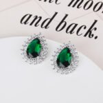 Wholesale Pave Cubic Zirconia Earrings with a silver plated finish and clear cubic zirconia stones from JuneJewelry.com – unique fashion jewelry for bulk orders.