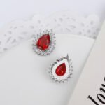 Wholesale Pave Cubic Zirconia Earrings with a silver plated finish and clear cubic zirconia stones from JuneJewelry.com – unique fashion jewelry for bulk orders.