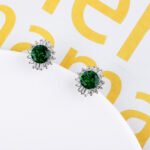 Wholesale Round Stud Earrings with a gold plated finish and clear cubic zirconia stones from JuneJewelry.com – unique fashion jewelry for bulk orders.